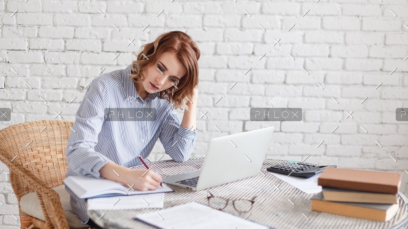 woman-freelancer-female-hands-with-pen-writing-on-P369BAX1-1